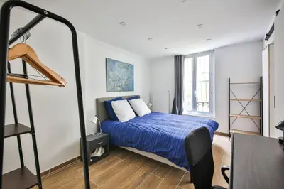 Un ou plusieurs lits dans un hébergement de l'établissement Le Nid de Montmartre