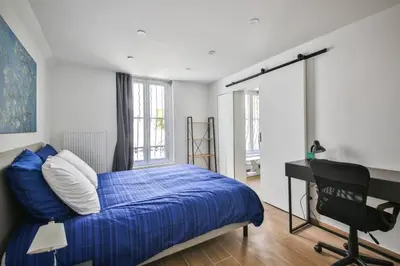 Un ou plusieurs lits dans un hébergement de l'établissement Le Nid de Montmartre
