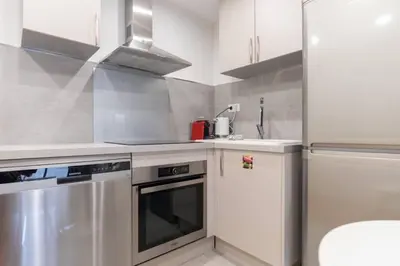 Cuisine ou kitchenette dans l'établissement Cœur 16eme, standing et calme