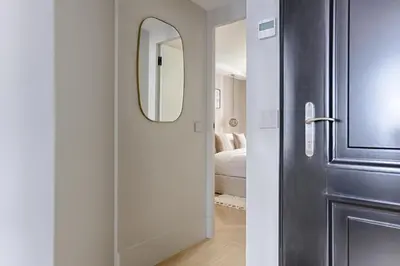 Un ou plusieurs lits dans un hébergement de l'établissement Unique Luxury Parisian flat 2BR/6P -Champs Elysées