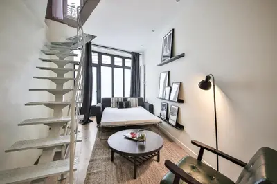 Coin salon dans l'établissement New Triplex 6Pers#ETOILE#Porte Maillot#Porte Champerret