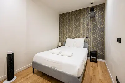 Un ou plusieurs lits dans un hébergement de l'établissement Apart 1 Bedroom # Buttes Chaumont # Paris 19