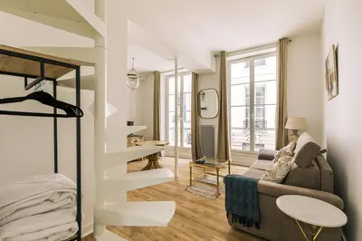Un ou plusieurs lits dans un hébergement de l'établissement GuestReady - Lovely studio in Paris, 15 minutes from Notre Dame Cathedral.