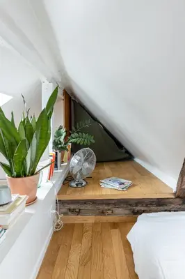 Un ou plusieurs lits dans un hébergement de l'établissement Veeve - In the Eaves of the Écuries
