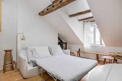 Un ou plusieurs lits dans un hébergement de l'établissement Veeve - In the Eaves of the Écuries