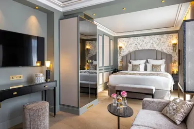 Un ou plusieurs lits dans un hébergement de l'établissement Hôtel Manolita Paris