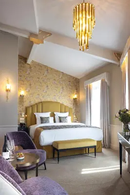 Un ou plusieurs lits dans un hébergement de l'établissement Hôtel Manolita Paris
