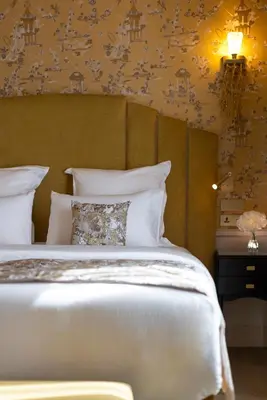 Un ou plusieurs lits dans un hébergement de l'établissement Hôtel Manolita Paris