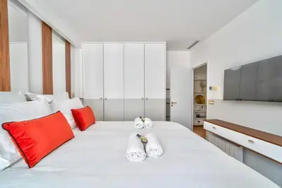 Un ou plusieurs lits dans un hébergement de l'établissement Sompteux appartement proche de L'Opéra