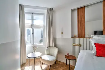 Un ou plusieurs lits dans un hébergement de l'établissement Sompteux appartement proche de L'Opéra