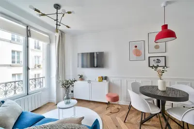 Télévision ou salle de divertissement dans l'établissement Sublime appartement au coeur de Paris