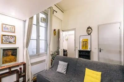 Coin salon dans l'établissement GuestReady - Cosy studio mezzanine in Paris