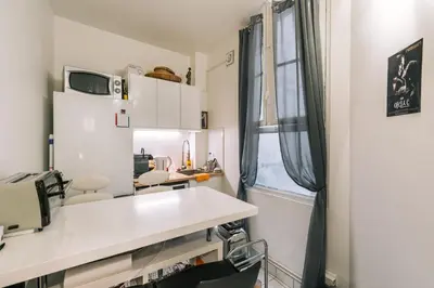 Cuisine ou kitchenette dans l'établissement GuestReady - Cosy studio mezzanine in Paris