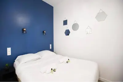 Un ou plusieurs lits dans un hébergement de l'établissement ParisConciergerie - Nice studio near Eiffel Tower