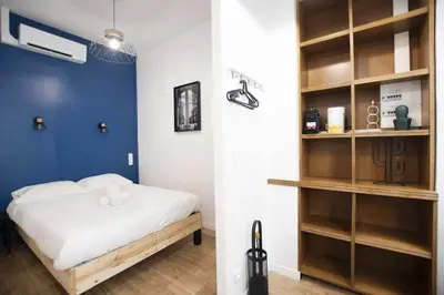 Un ou plusieurs lits dans un hébergement de l'établissement Superbe studio proche tour Eiffel