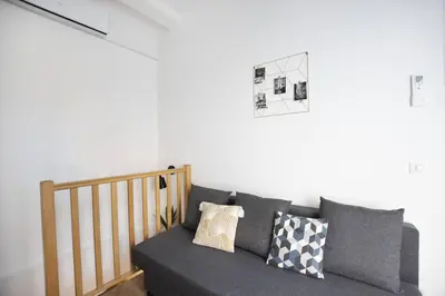 Coin salon dans l'établissement Bel appartement idéalement situé - Tour Eiffel