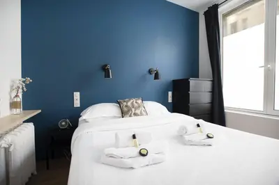 Un ou plusieurs lits dans un hébergement de l'établissement Bel appartement idéalement situé - Tour Eiffel