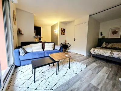 Coin salon dans l'établissement Bel Appartement Parisien