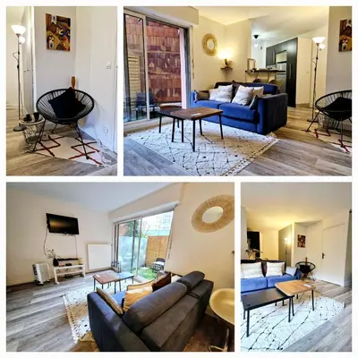 Coin salon dans l'établissement Bel Appartement Parisien