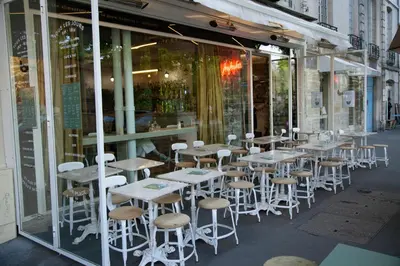 Restaurant ou autre lieu de restauration dans l'établissement Le Marais Chic AC