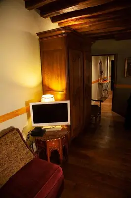 Télévision ou salle de divertissement dans l'établissement Le Marais Chic AC