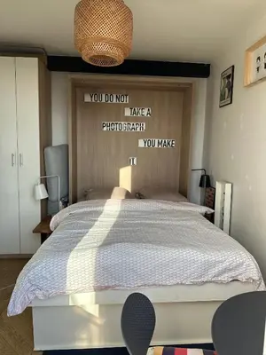 Un ou plusieurs lits dans un hébergement de l'établissement Studio vue Paris - Quartier Canal Saint-Martin