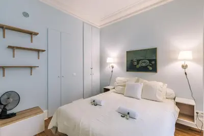 Un ou plusieurs lits dans un hébergement de l'établissement GuestReady - Apt spacieux et exquis dans le 17ème