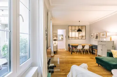 Coin salon dans l'établissement GuestReady - Apt spacieux et exquis dans le 17ème