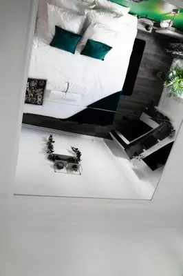Un ou plusieurs lits dans un hébergement de l'établissement Suite L'éclipse Paris, logement avec jacuzzi, à 10 minutes des Champs Elysées