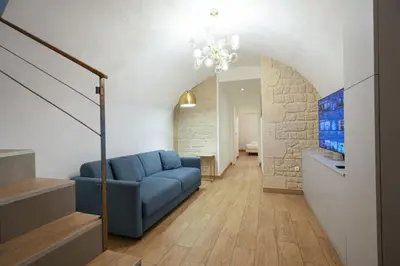 Coin salon dans l'établissement Loft 2 BR Marais, Notre Dame AC by LCC Agency