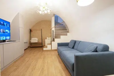 Coin salon dans l'établissement Loft 2 BR Marais, Notre Dame AC by LCC Agency