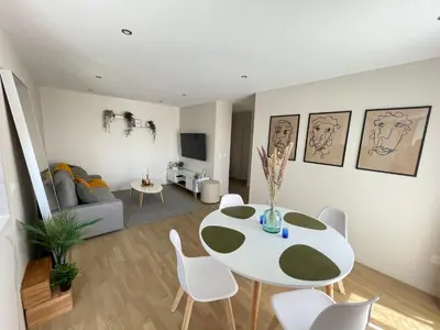 Coin salon dans l'établissement Charmant logement aux portes de Paris - STADE DE FRANCE - 12 min à pied