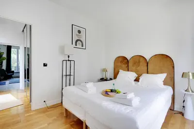 Un ou plusieurs lits dans un hébergement de l'établissement Charming apartment - 1BR-4P - Parc Monceau