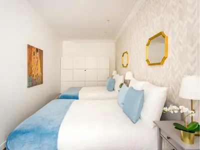 Un ou plusieurs lits dans un hébergement de l'établissement Merveil - Family Suite - Marais - Saint Denis II