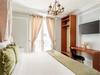 Un ou plusieurs lits dans un hébergement de l'établissement Merveil - Luxury Suite - Louvre - Aboukir VII
