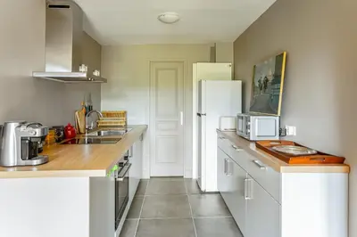 Cuisine ou kitchenette dans l'établissement Appartement Barrio - Welkeys