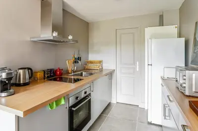Cuisine ou kitchenette dans l'établissement Appartement Barrio - Welkeys