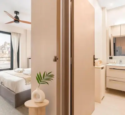 Un ou plusieurs lits dans un hébergement de l'établissement Eiffel Tower - Premium apartment with balcony and lift for 4