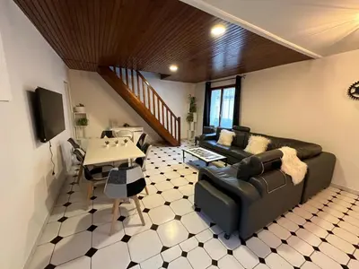 Coin salon dans l'établissement Agréable appartement dans une maison