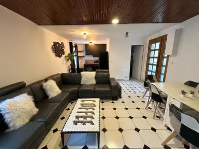 Coin salon dans l'établissement Agréable appartement dans une maison