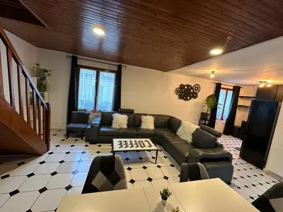 Coin salon dans l'établissement Agréable appartement dans une maison