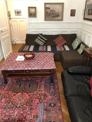 Coin salon dans l'établissement Bel Appartement Haussmannien - Gare de Lyon