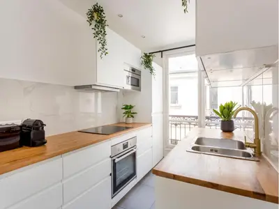Cuisine ou kitchenette dans l'établissement Merveil Family Suite - Tilsitt - Eiffel Tower view