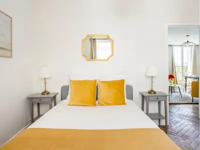 Un ou plusieurs lits dans un hébergement de l'établissement Merveil Family Suite - Tilsitt - Eiffel Tower view