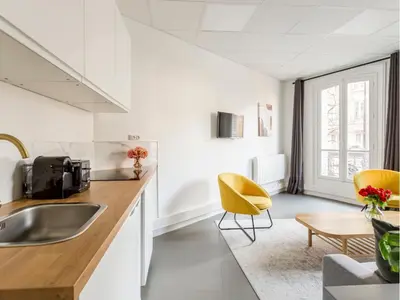 Cuisine ou kitchenette dans l'établissement Merveil - Family Suite - Marais - Turbigo I