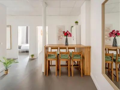Coin salon dans l'établissement Merveil - Family Suite - Marais - Turbigo I
