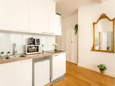 Cuisine ou kitchenette dans l'établissement Merveil - Family Suite - Louvre - Sentier I
