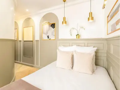 Un ou plusieurs lits dans un hébergement de l'établissement Merveil - Luxury Suite - Louvre - Rousseau