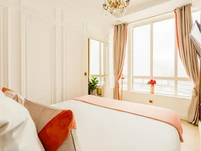 Un ou plusieurs lits dans un hébergement de l'établissement Merveil - Luxury Suite - Louvre - Rousseau