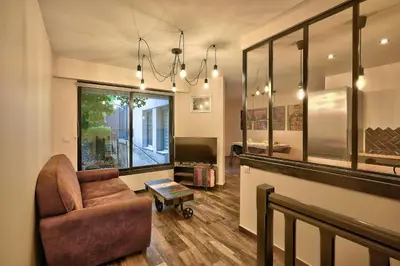 Coin salon dans l'établissement ParisConciergerie - 2BR apartment 4 people